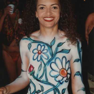 Unknown woman with her breast painted.