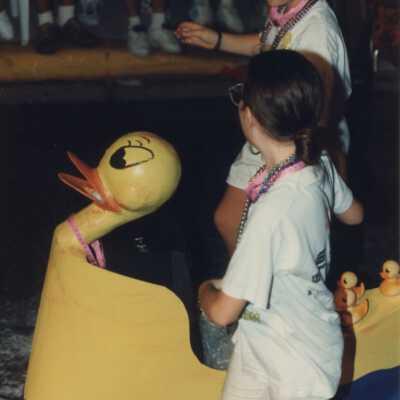 Unknown people walking in the parade.