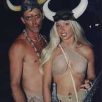 An unknown couple dressed up.