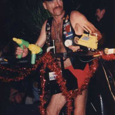 Unknown man dressed up on a float.