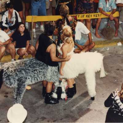 Unknown people dressed up.