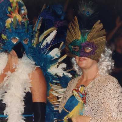 Two unknown people dressed up.