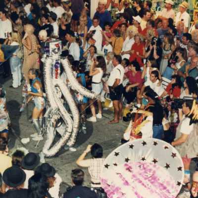 Unknown person dressed up in a costume in the parade.
