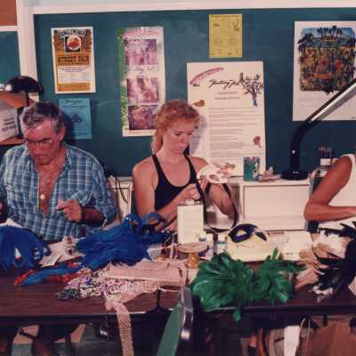 Unknown people making face masks.