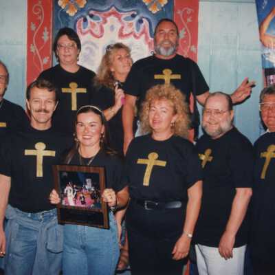 Unknown group of people with a plaque.