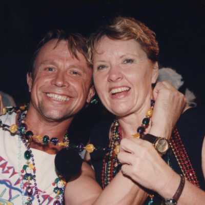Unknown people watching the parade.