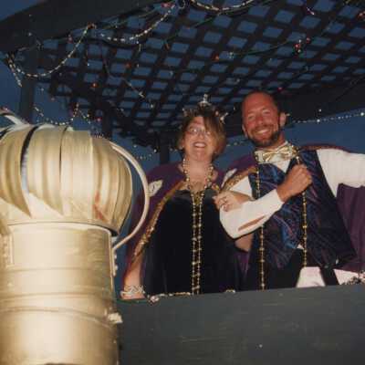 Fantasy Fest queen and king on a float.
