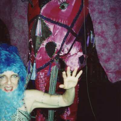 An unknown woman dressed up.