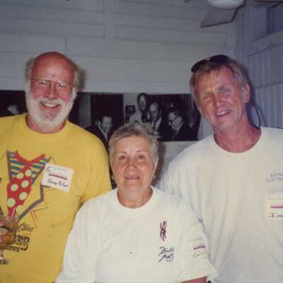 Three unknown people at a FF party.