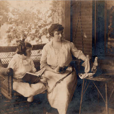 Unknown Woman and Young Girl on Swing