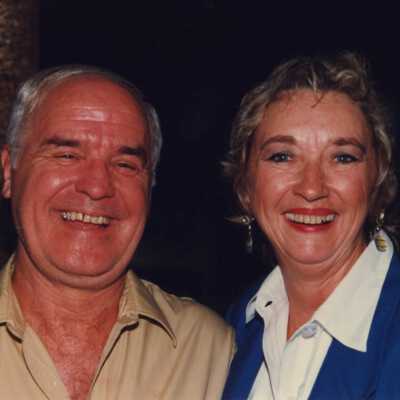 Unknown woman and man at the awards ceremony.