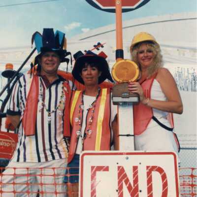 Unknown people dressed up on a Fantasy Fest float.
