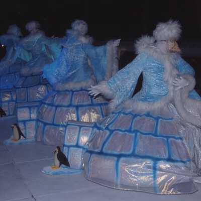 Unknown people dressed up.