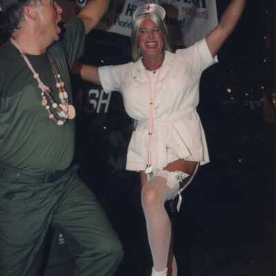 Unknown people dressed up on a float.