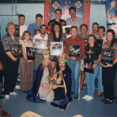 King Frank Cicalese and unknown queen of Fantasy Fest with Dennis Beaver and an unknown group of people.