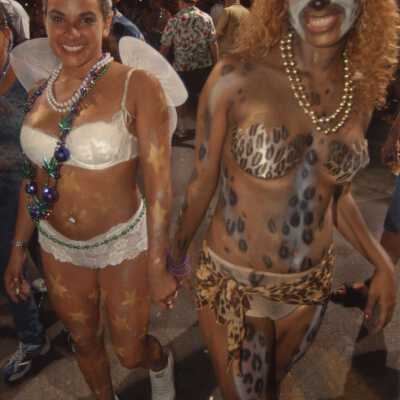 Two unknown people dressed up.