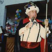 An unknown man dressed up.