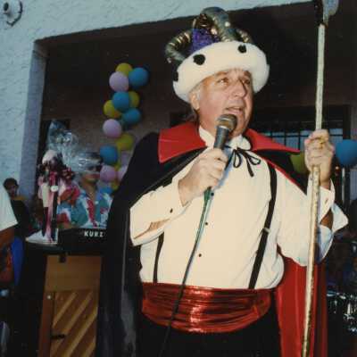 An unknown man dressed up.