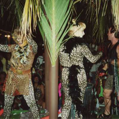 Unknown people dressed up on a float.