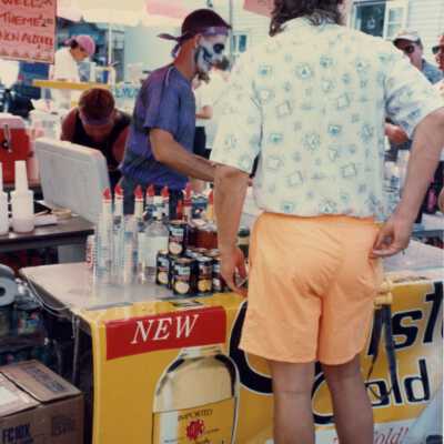 Unknown man at the Cristal gold alcohol booth.