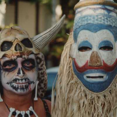 Two unknown people dressed up.