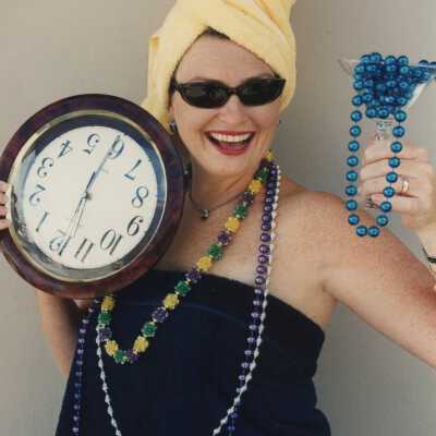 Unknown woman dressed up holding a clock.
