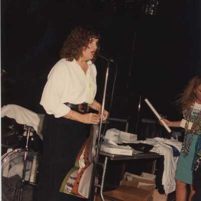 Unknown woman talking.