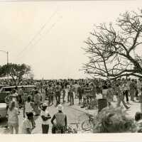 A group of people standing around