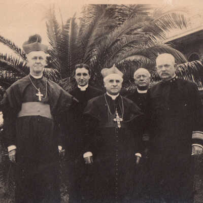An U.S. Navy Admiral and Four Priests