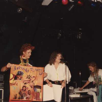 Unknown people talking.