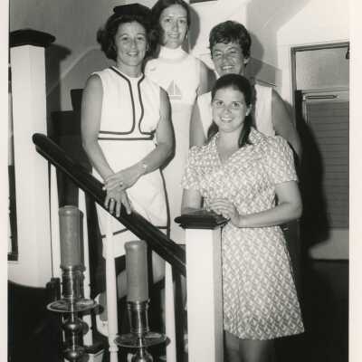Unknown woman standing on a staircase