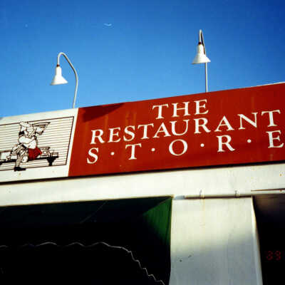 The Restaurant Store Sign