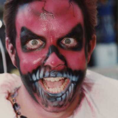 Unknown man with his face painted.