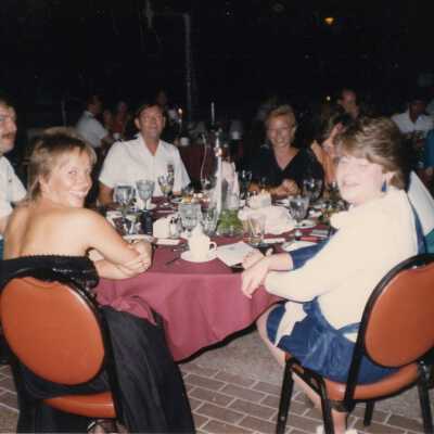 Unknown people at a party sitting at a table