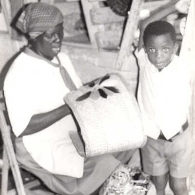 Unknown woman making a basket