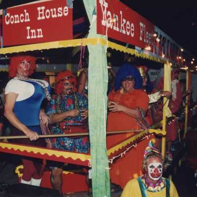 Unknown people on a float in the parade.