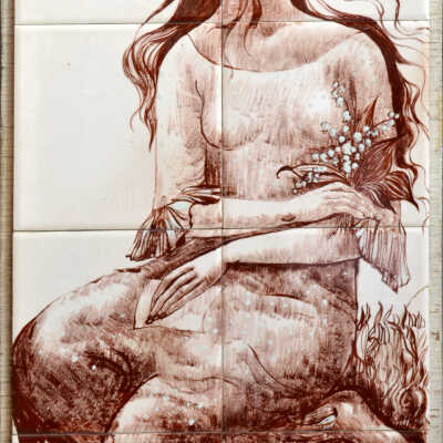 Bride Kneeling with Lily of the Valley