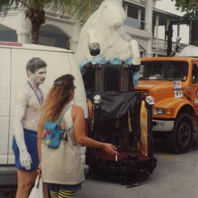 Two unknown people getting ready for the parade.