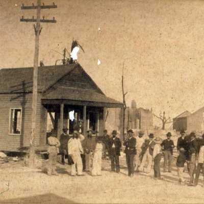 Men in Front of Hurricane Damage: Copyright: © Key West Art & Historical Society; Origformat: Print-Photographic