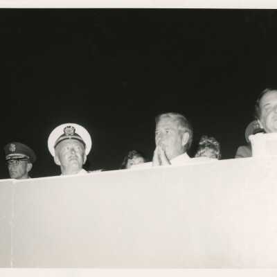 Unknown people sitting at a ceremony