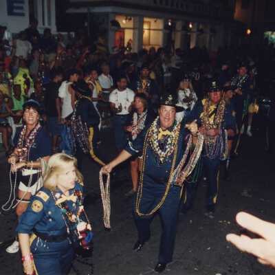 Unknown people dressed up in the parade.