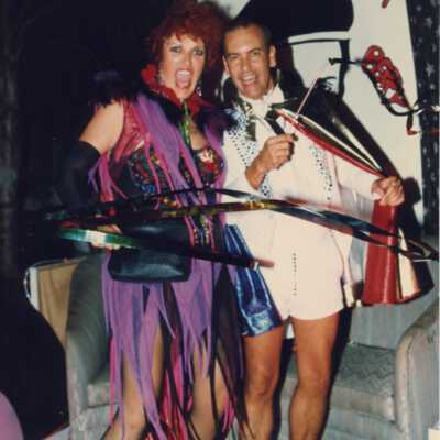 Tom Luna and Vicki Roush dressed up on a float.