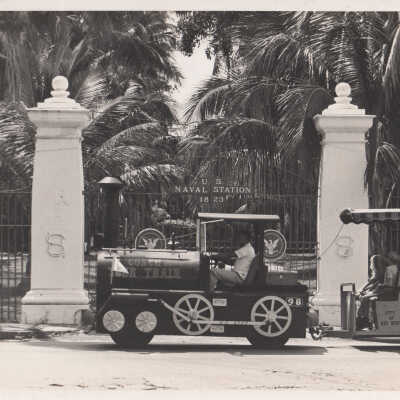 Conch tour train in front of the Presidential Gates
