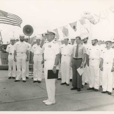 Men in uniform standing outside