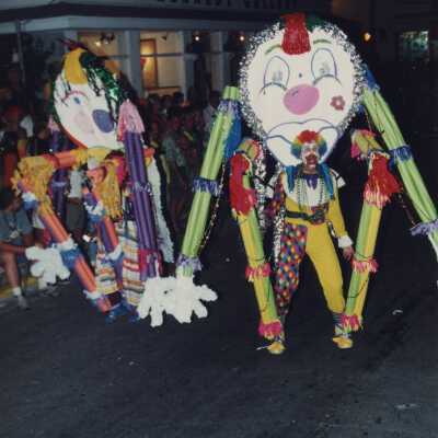 Two unknown people dressed up in the parade.