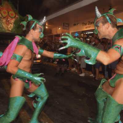 Two unknown people dressed up in the parade.