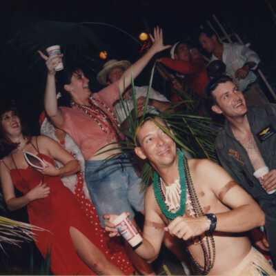 Unknown people dressed up on a float.