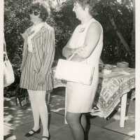 2 Unknown woman standing talking