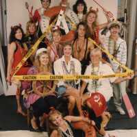 A group of unknown people dressed up.