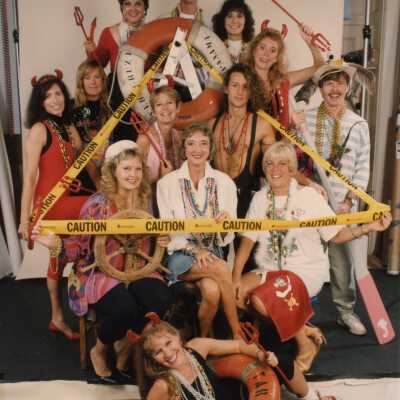 A group of unknown people dressed up.